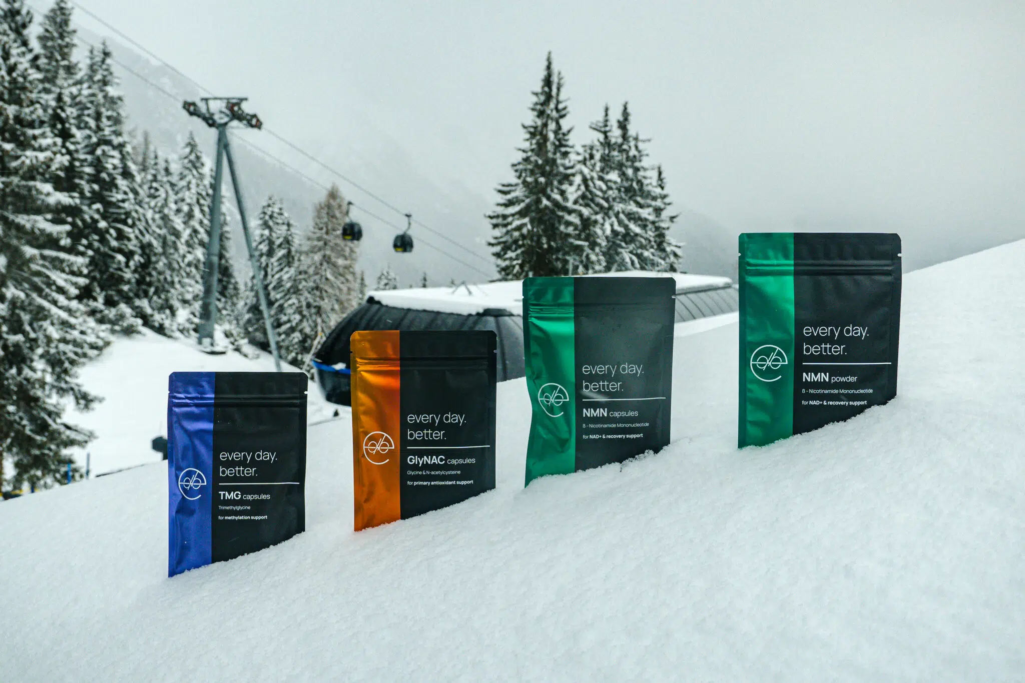 View all Every Day Better supplements side by side in the snow